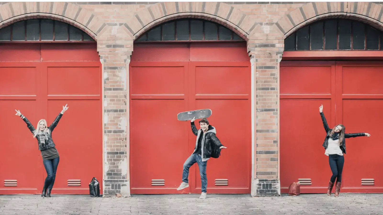 Happy People in front of a building